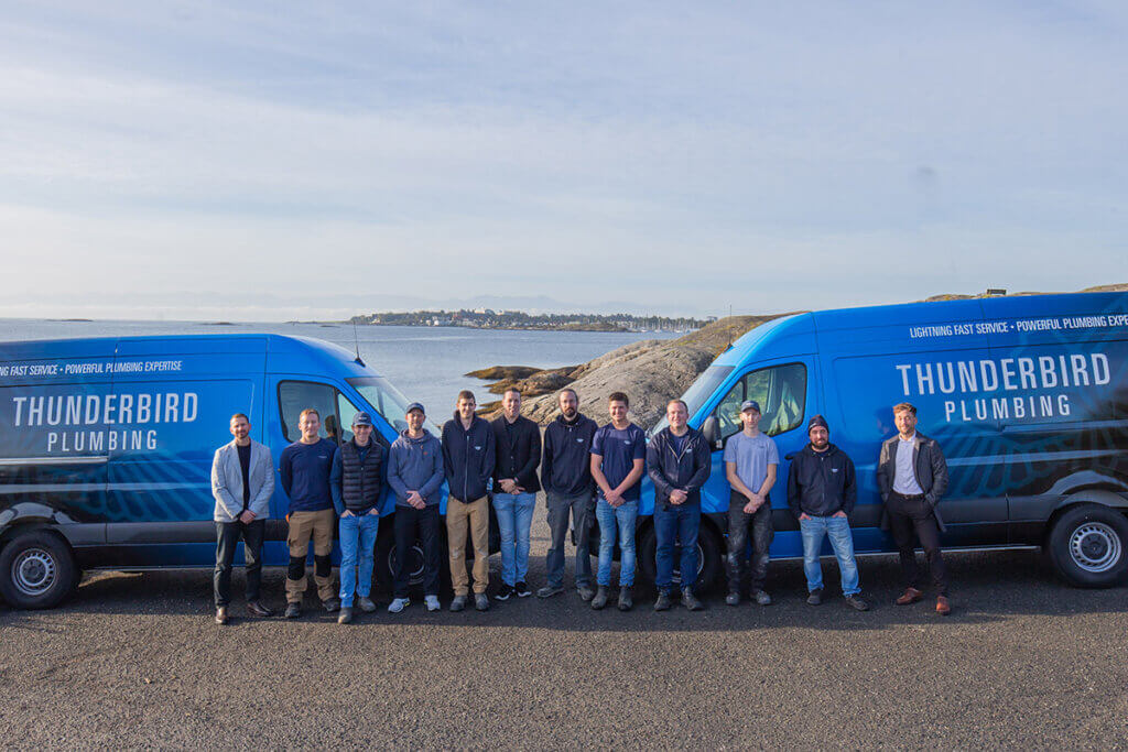 Thunderbird Plumbing Team Members and vans